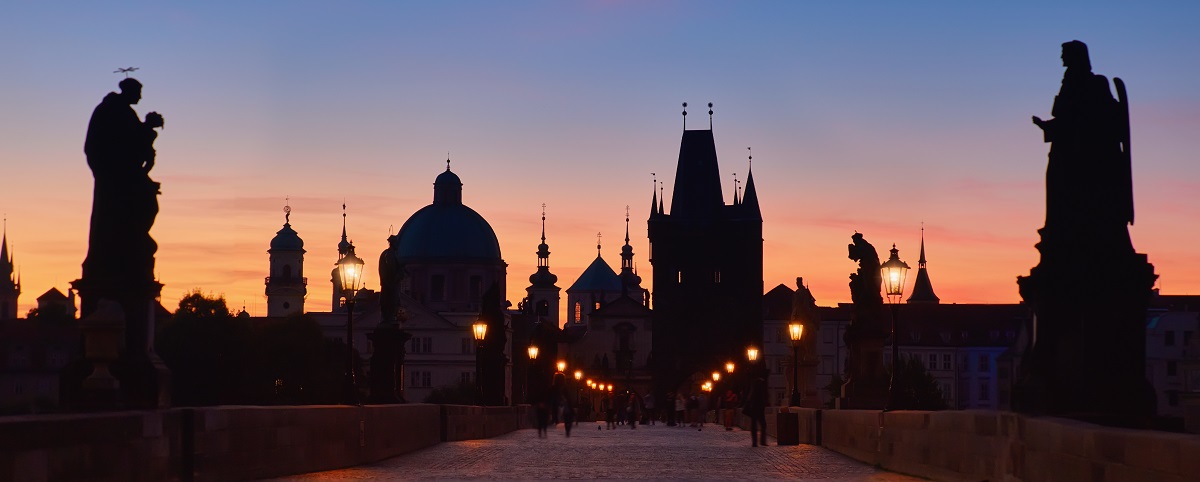Prague at night, panoramic image. Charles Bridge early in the mo