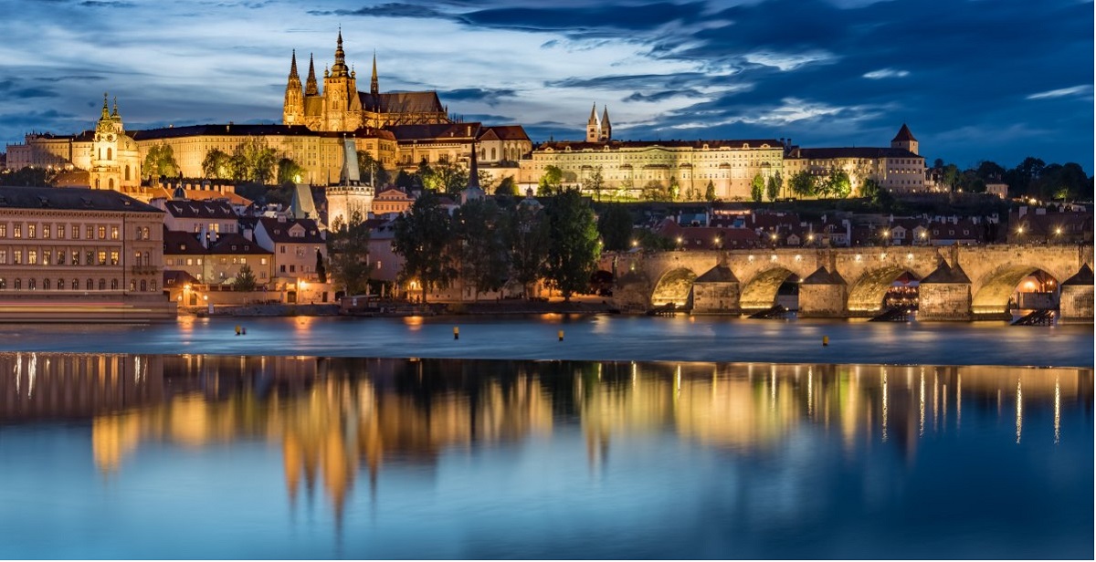 Prague Castle with cloudy sunset blue sky and Charles Bridge, Czech Republic