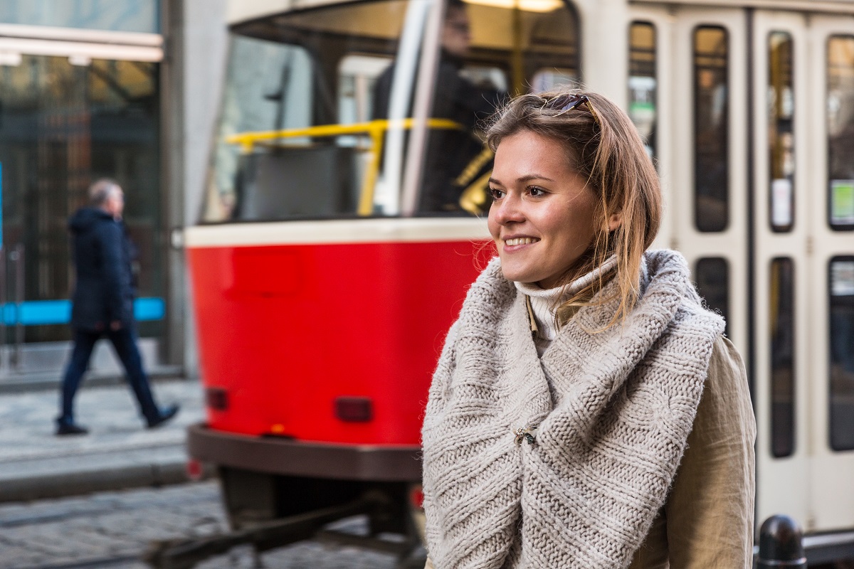 Young Woman at Tram Stop